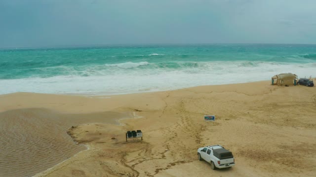 DREAMS RESORT LOS CABOS BCS MEXICO-2021: SUV Moving Across Sandy Beach