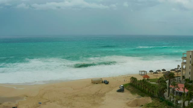 DREAMS RESORT LOS CABOS BCS MEXICO-2021: Beach Scene with Moving Vehicles and Ocean Waves