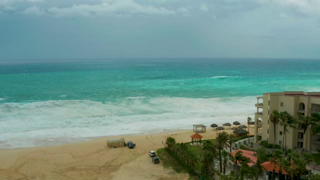 DREAMS RESORT LOS CABOS BCS MEXICO-2021: Beach with Darkening Sky and Moving Vehicles