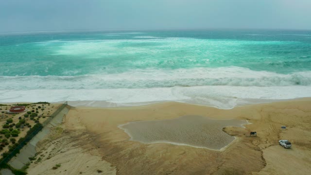 DREAMS RESORT LOS CABOS BCS MEXICO-2021: Ocean Waves Crashing on Sandy Beach From Above