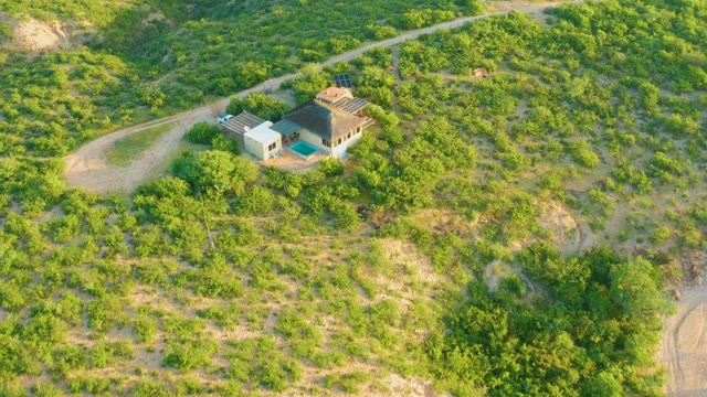 CABO PULMO BCS MEXICO-2021: Aerial Approach to a House on a Green Hillside