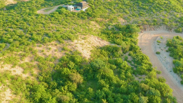 CABO PULMO BCS MEXICO-2021: House on Green Hillside with Winding Road