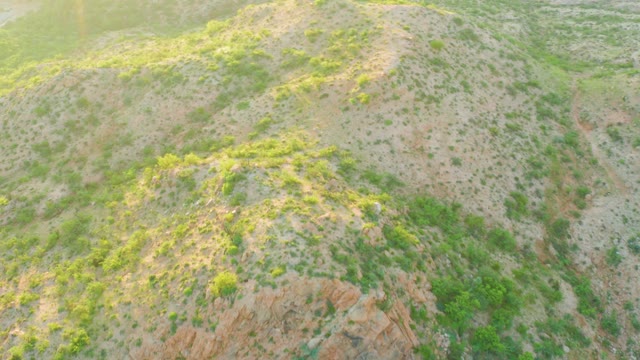 CABO PULMO BCS MEXICO-2021: Hilly Landscape with Sparse Greenery and Rocky Patches