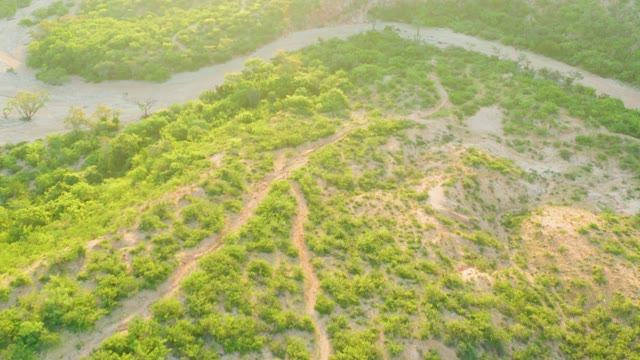 CABO PULMO BCS MEXICO-2021: Winding River Through Lush Green and Sandy Terrain