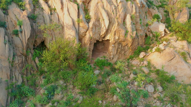 CABO PULMO BCS MEXICO-2021: Rocky Formation with Vegetation and Cave Entrance