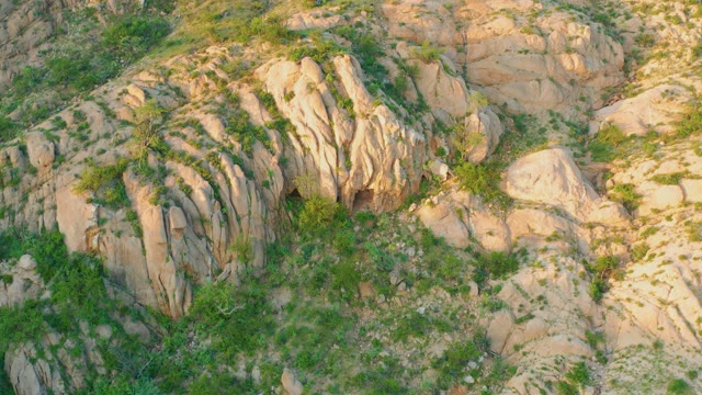 CABO PULMO BCS MEXICO-2021: Rocky Hillside with Green Vegetation in Warm Light
