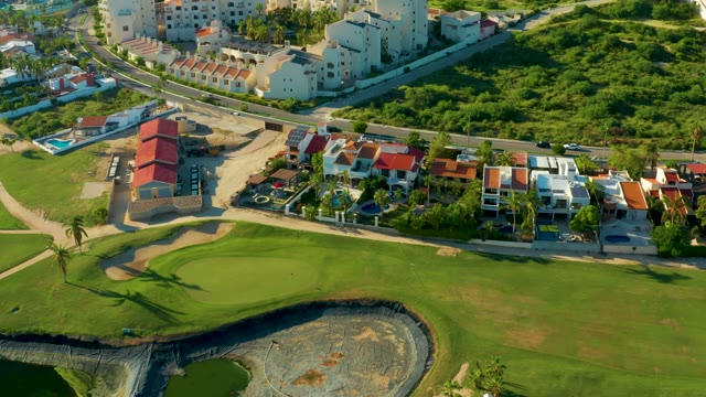 SAN JOSE DEL CABO BCS MEXICO-2021: Golf Course and Residential Buildings in Suburban Area