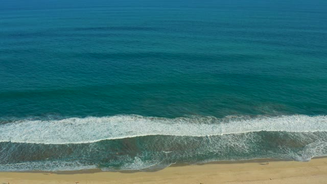 SAN JOSE DEL CABO BCS MEXICO-2021: Waves Rolling Onto Sandy Beach