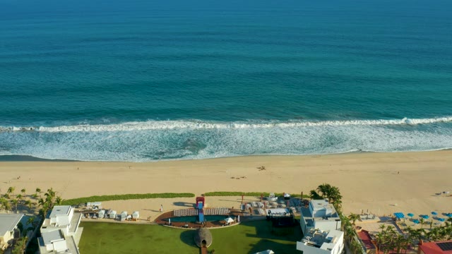 SAN JOSE DEL CABO BCS MEXICO-2021: Sandy Beach and Ocean Waves From Descending View