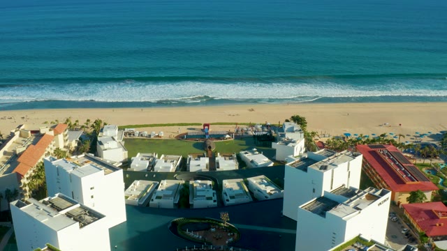 SAN JOSE DEL CABO BCS MEXICO-2021: Resort Buildings Along Sandy Beach and Ocean