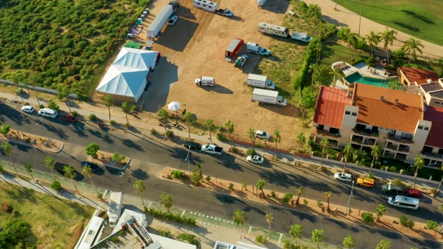 SAN JOSE DEL CABO BCS MEXICO-2021: Vehicles Moving on Road and in Lot From Above