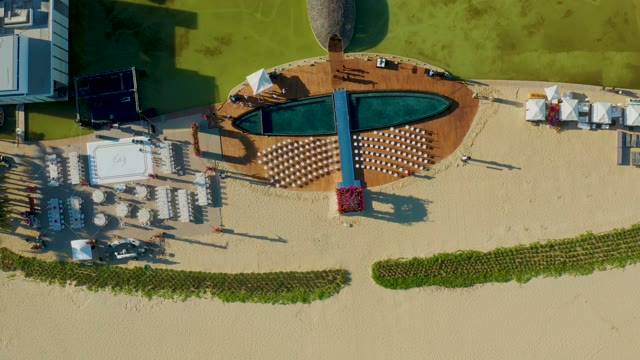 SAN JOSE DEL CABO BCS MEXICO-2021: Beach Pool and Lounge Area with People Moving