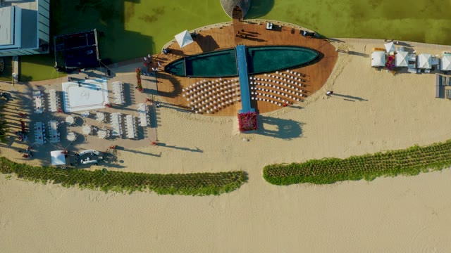 SAN JOSE DEL CABO BCS MEXICO-2021: Beachgoers Moving near Pool and Lounge Area