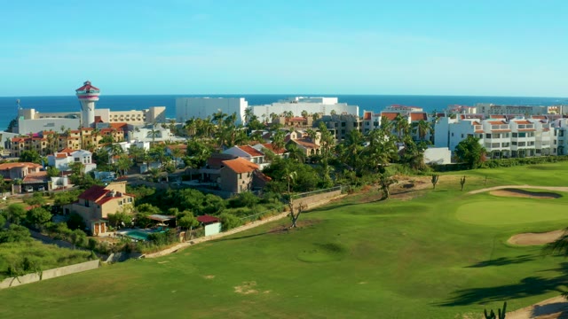SAN JOSE DEL CABO BCS MEXICO-2021: Aerial Pan of Coastal Golf Course and Buildings