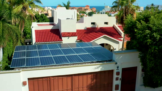 SAN JOSE DEL CABO BCS MEXICO-2021: House with Solar Panels and Palm Trees From Above