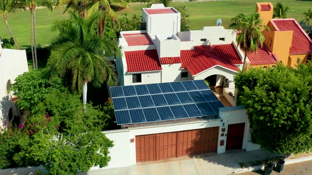 SAN JOSE DEL CABO BCS MEXICO-2021: House with Solar Panels and Palm Trees