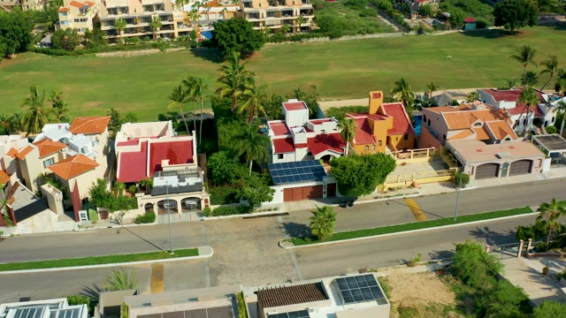 SAN JOSE DEL CABO BCS MEXICO-2021: Car Moving Along Residential Street