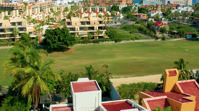 SAN JOSE DEL CABO BCS MEXICO-2021: Residential Area with Green Field and Palm Trees