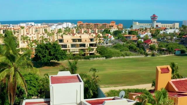SAN JOSE DEL CABO BCS MEXICO-2021: Coastal Residential Area with Green Field and Ocean