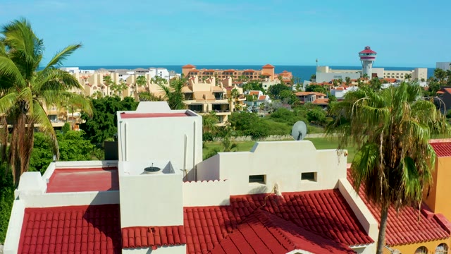 SAN JOSE DEL CABO BCS MEXICO-2021: Rooftop View of Coastal Residential Area with Palm Trees