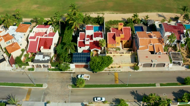 SAN JOSE DEL CABO BCS MEXICO-2021: Car Moving on Residential Street From Above
