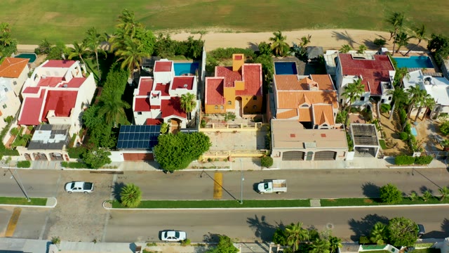 SAN JOSE DEL CABO BCS MEXICO-2021: Vehicles Traveling on Coastal Residential Street