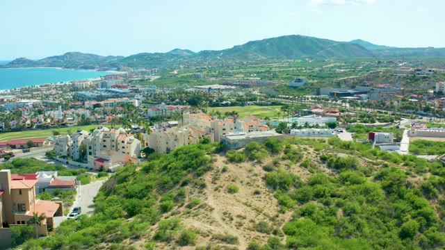 SAN JOSE DEL CABO BCS MEXICO-2021: Car Moving Along a Coastal Residential Road