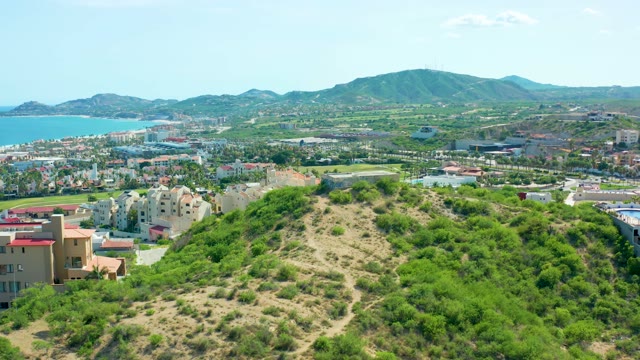 SAN JOSE DEL CABO BCS MEXICO-2021: Hillside Greenery and Coastal Urban Landscape