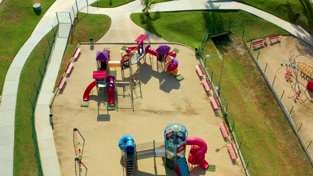 SAN JOSE DEL CABO BCS MEXICO-2021: A Person Walking Along a Curved Playground Path