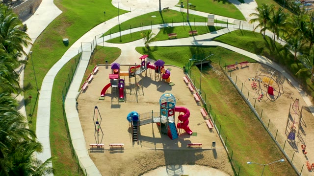 SAN JOSE DEL CABO BCS MEXICO-2021: Playground with Slides and Benches in a Park
