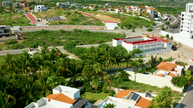 SAN JOSE DEL CABO BCS MEXICO-2021: Residential Neighborhood with Palm Trees and Road