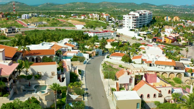 SAN JOSE DEL CABO BCS MEXICO-2021: Residential Neighborhood with Curving Road and Orange Roofs