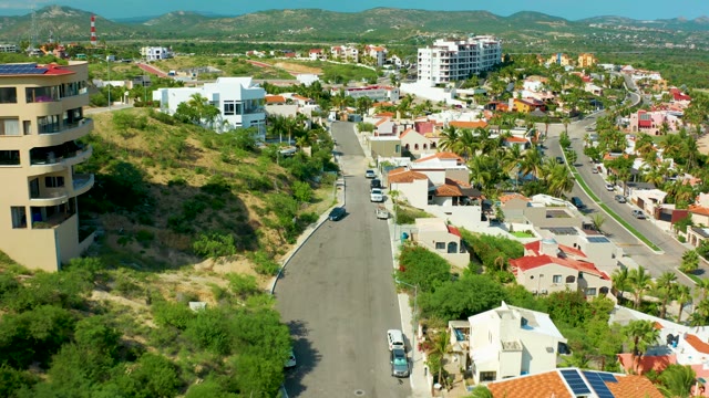 SAN JOSE DEL CABO BCS MEXICO-2021: Residential Neighborhood Aerial with Road and Vehicles