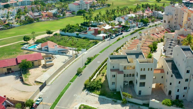 SAN JOSE DEL CABO BCS MEXICO-2021: Residential Street with Buildings and Green Fields