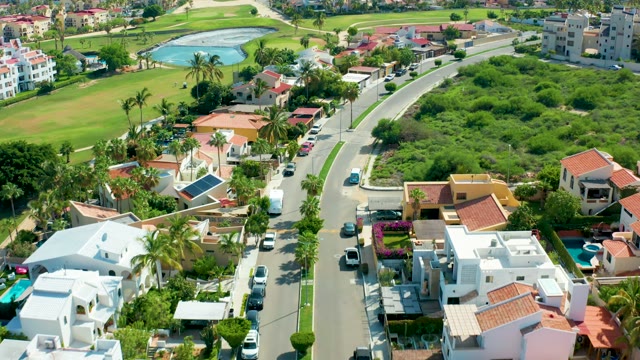 SAN JOSE DEL CABO BCS MEXICO-2021: Residential Street with Van Driving Past