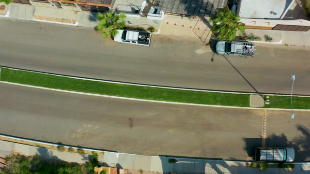 SAN JOSE DEL CABO BCS MEXICO-2021: Overhead View of a Quiet Residential Street with Parked Cars