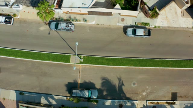 SAN JOSE DEL CABO BCS MEXICO-2021: Cars Moving Along a Residential Street