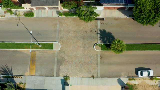 SAN JOSE DEL CABO BCS MEXICO-2021: Tilting Streetlight at Residential Intersection