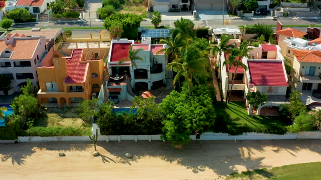 SAN JOSE DEL CABO BCS MEXICO-2021: Beachfront Residences with Red Roofs and Sandy Shore