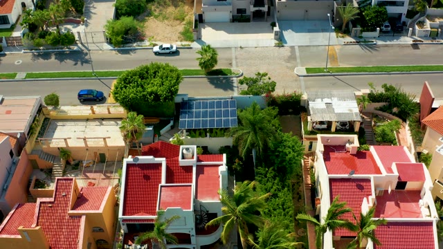 SAN JOSE DEL CABO BCS MEXICO-2021: Residential Neighborhood with Moving Car and Palm Trees