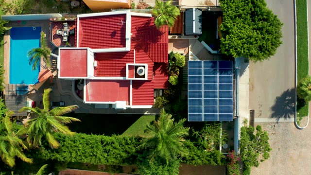 SAN JOSE DEL CABO BCS MEXICO-2021: Residential House with Red Roof and Driveway Vehicle Activity