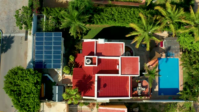 SAN JOSE DEL CABO BCS MEXICO-2021: House with Red Roof, Solar Panels, and Pool