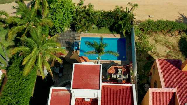 SAN JOSE DEL CABO BCS MEXICO-2021: Overhead View of Pool and Moving Vehicle
