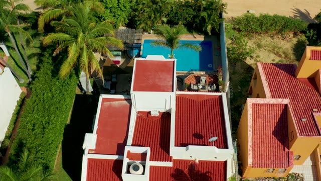 SAN JOSE DEL CABO BCS MEXICO-2021: Red-Tiled Roofs and Pool in Residential Area