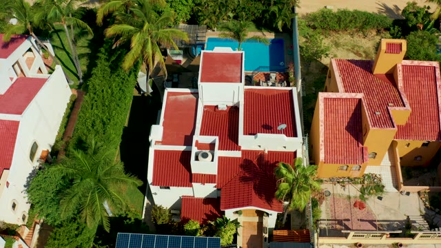 SAN JOSE DEL CABO BCS MEXICO-2021: Red-tiled Roofs and Pool in Residential Area