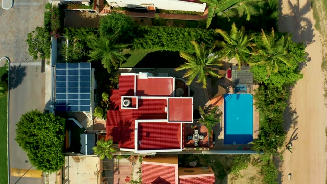 SAN JOSE DEL CABO BCS MEXICO-2021: Person Working on Residential Roof From Above