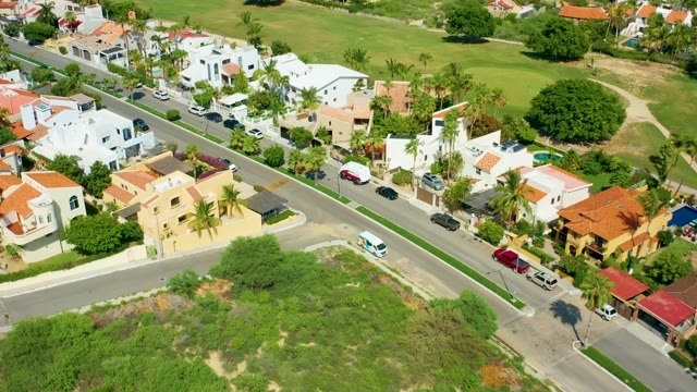SAN JOSE DEL CABO BCS MEXICO-2021: Residential Street with Van Moving Along Road
