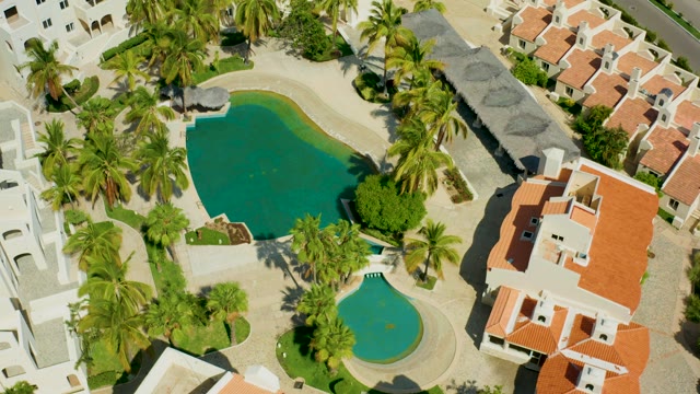 SAN JOSE DEL CABO BCS MEXICO-2021: Residential Complex with Swimming Pools and Palm Trees