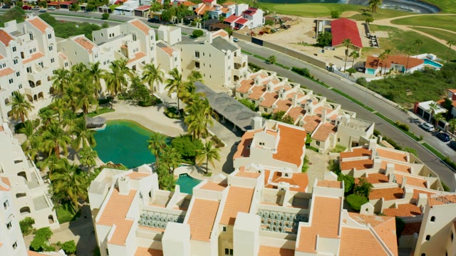 SAN JOSE DEL CABO BCS MEXICO-2021: Residential Complex with Pool and Road Traffic
