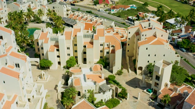 SAN JOSE DEL CABO BCS MEXICO-2021: Overhead View of Residential Complex with White Buildings and Red Roofs